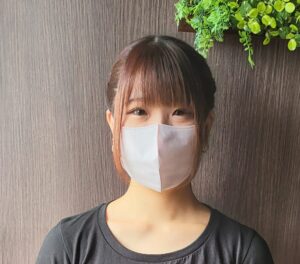 a woman wearing a face mask